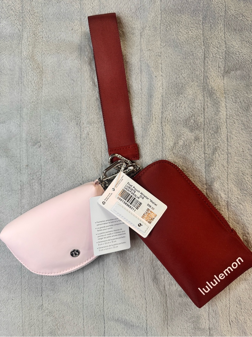 lululemon athletica red wristlet with light pink coin pouch